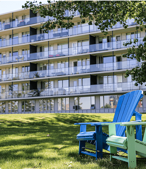 Condo building with lawn chairs